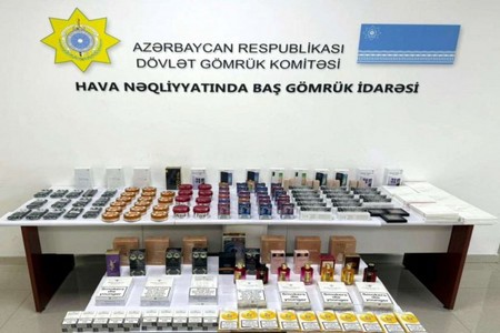 Sərnişinlərə paylanılaraq gömrükdən qanunsuz keçirilməsinə cəhd edilən mallar tutulub