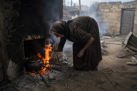 Ocaq qalayan ahıl qadın yanaraq öldü