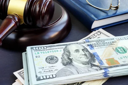 Dövlətə 385 min manat borcu olan inşaat şirkətinə 10 min dollardan çox cərimə kəsildi
