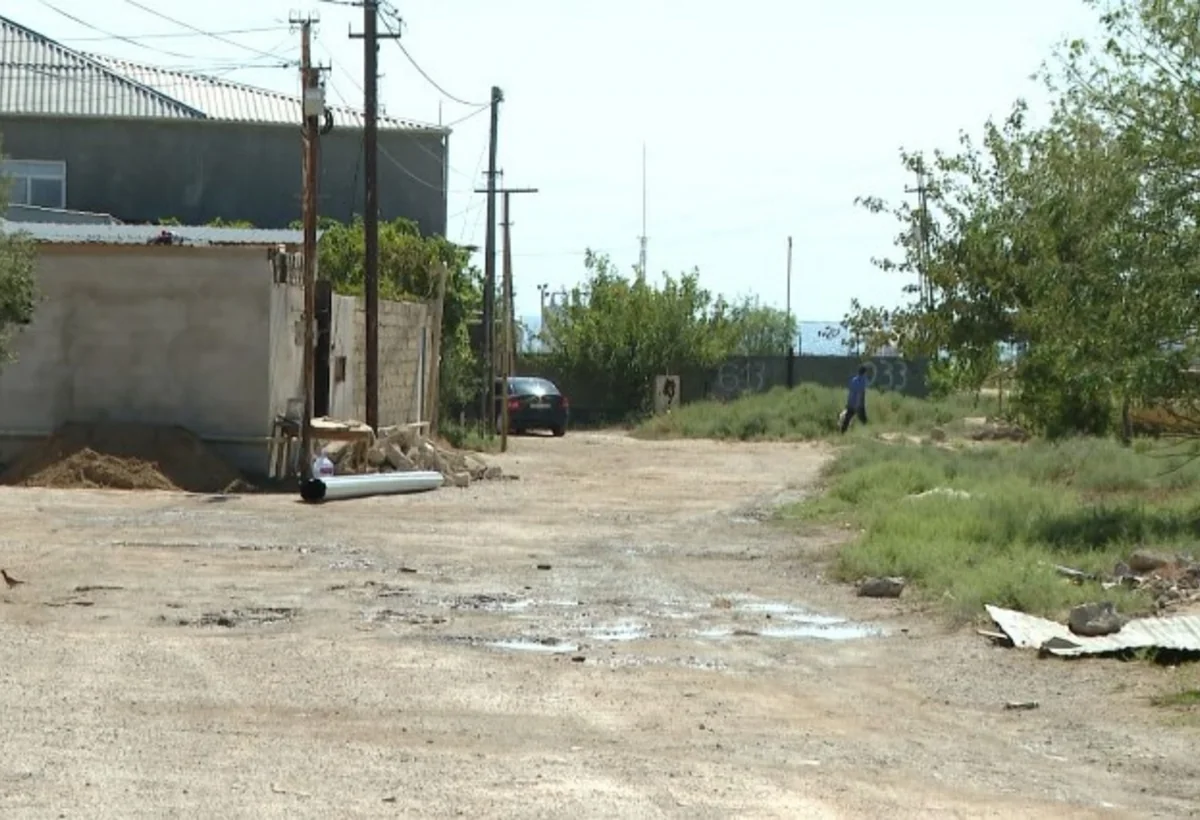 Zığ bağlarının yolunda iri çuxurlar yaranıb - VİDEO
